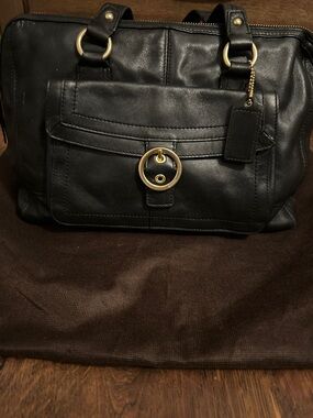 Coach Black Leather Shoulder Bag with Gold Ring Accent